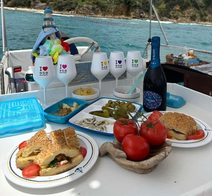 Catamaran tour along the Cefalù coast with aperitif and snorkeling - The Practical Side: Booking, Cost, and Conditions