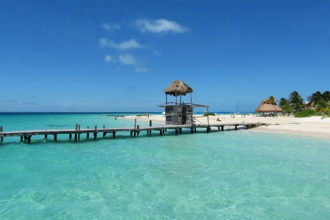 Catamaran Tour to Isla Mujeres, Open Bar, Lunch, Snorkeling, Beach Club Included - Cancellation Policy