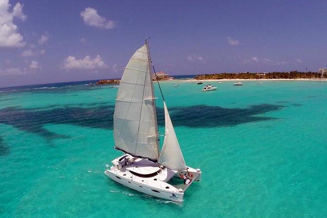 Catamaran Tour to Isla Mujeres, Open Bar, Lunch, Snorkeling, Beach Club Included - Frequently Asked Questions