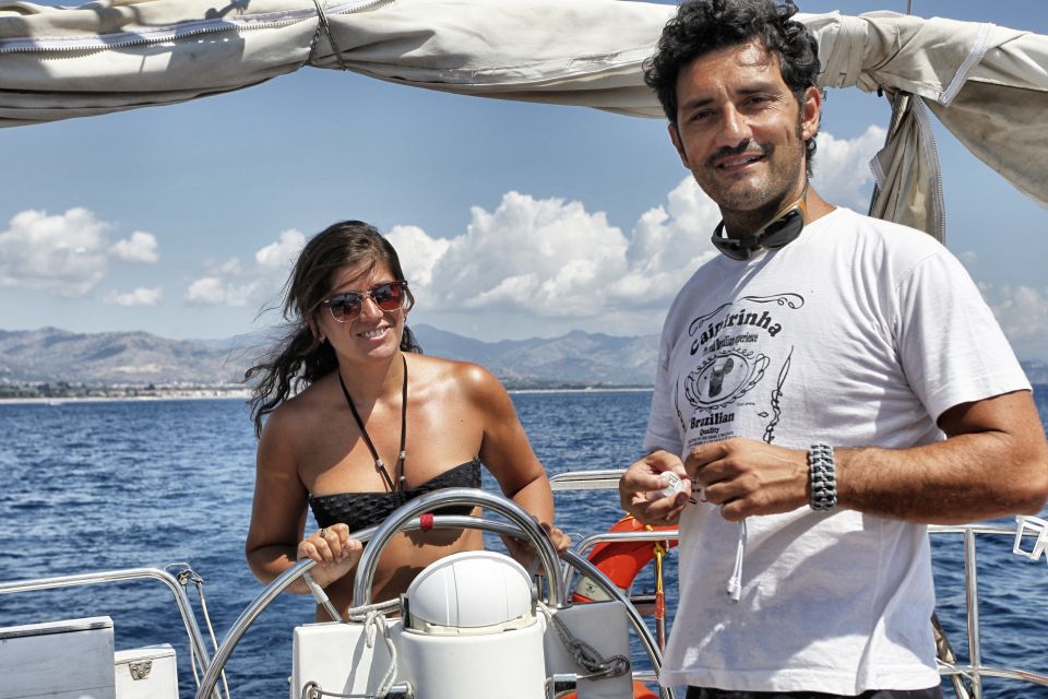 Catania: Full-Day Boat Trip to Acitrezza With Lunch - Key Points