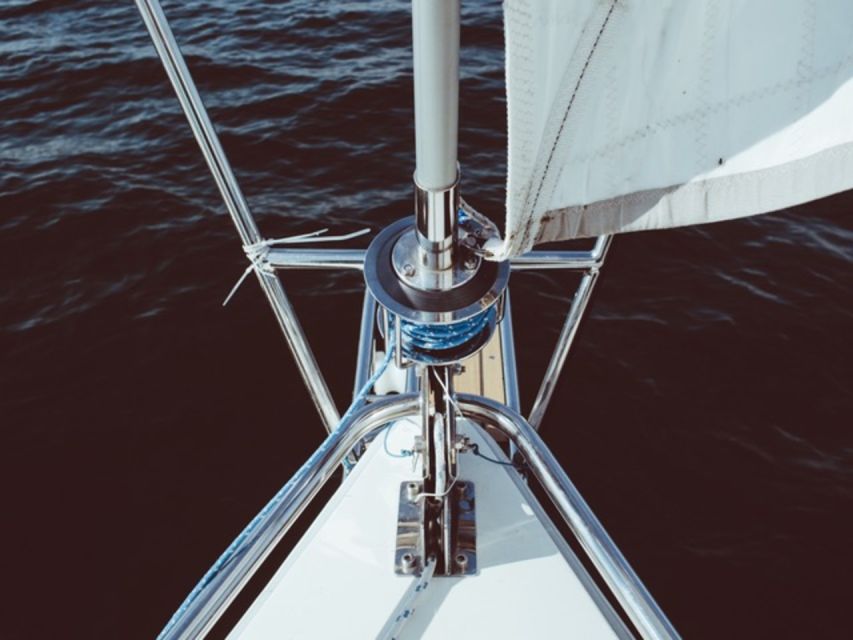 Catania: Sailing Tour to the Cyclops Riviera With Aperitif - Professional Skipper and Small Group