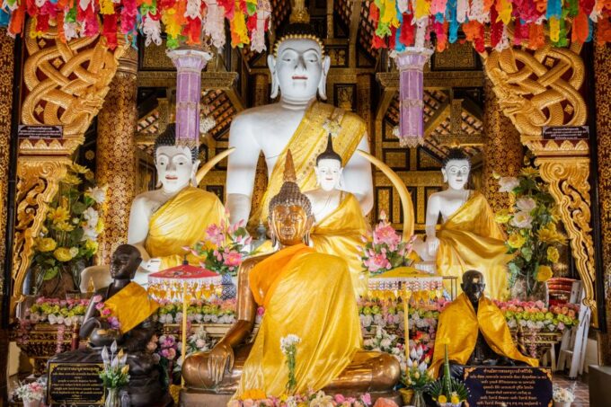 Chiang Mai's Highlights: Sightseeing Night Bike Tour - Wat Lok Moli: Illuminated Stupa and Wooden Prayer Hall
