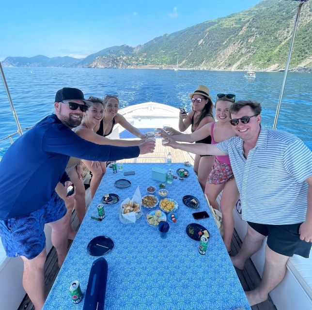 Cinque Terre Boat Tour With a Traditional Ligurian Gozzo - Enjoying the Crystalline Waters