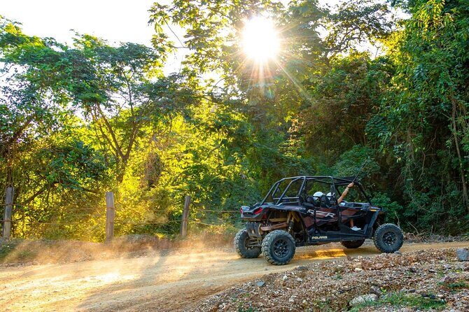 Cross the vehicle bridge with waterfall in RZR ATV - Introduction: An Adventure for Heart and Soul in Puerto Vallarta