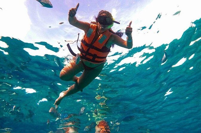 Crystal-clear Boat trip & Snorkeling tour - The Sum Up