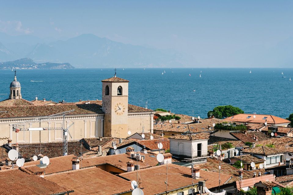 Desenzano:Sunset Walking and Boat Tour With Drink on Board - Booking and Pricing