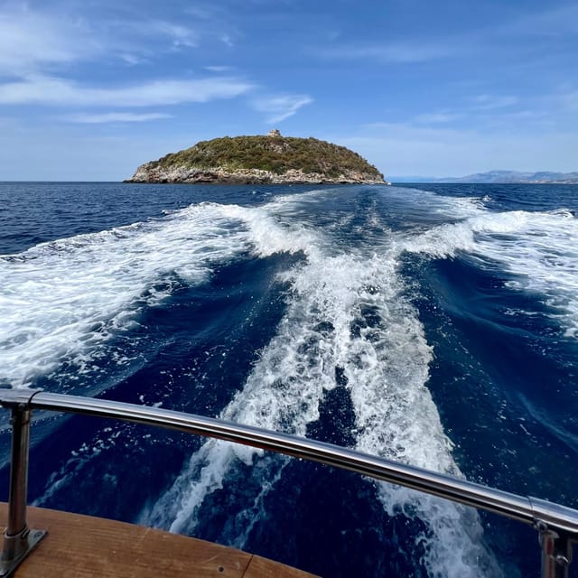 Dino Island & Arcomagno Eco-Boat Tour With Train - Key Points