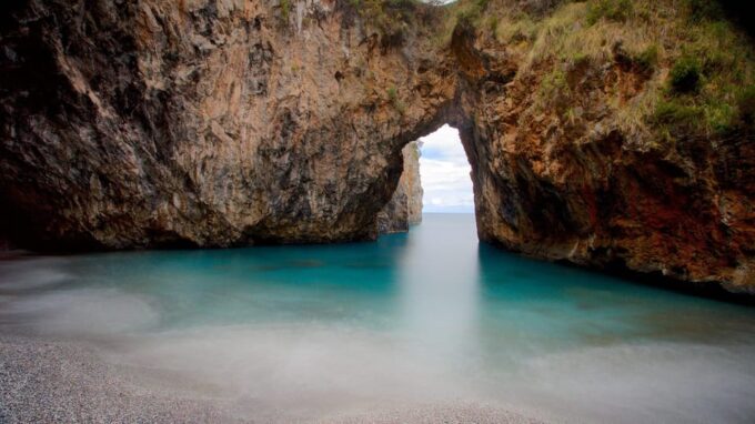 Dino Island & Arcomagno Eco-Boat Tour With Train - Exploring Dino Island