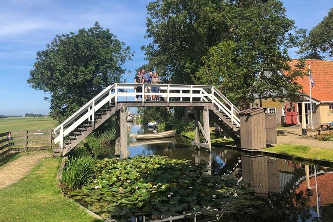 Discover the Amsterdam Lake District and Tulip Fields Tour - Afsluitdijk and Aldfaers Yard