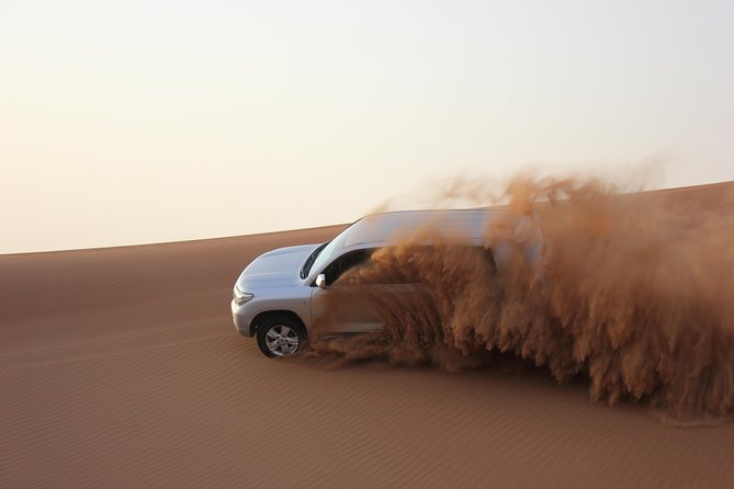 Dubai Red Dune Extreme Desert Safari Adventure With Sand Boarding - Transportation and Pickup Details