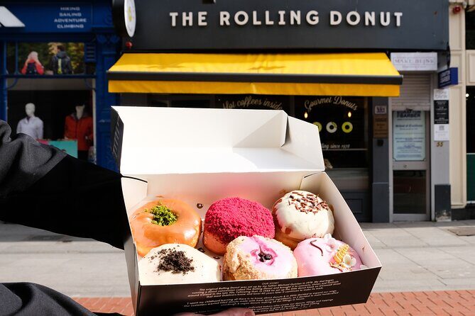 Dublin Holiday Donut Adventure & Walking Food Tour - Crossing the River Liffey and Visiting Historic Sites