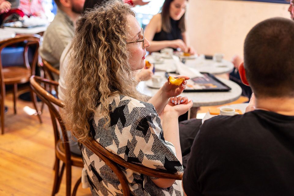 Eating Lisbon: Food and Cultural Walking Tour - Tasting Local Dishes and Drinks