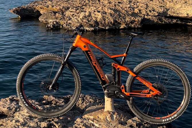 Ebike Tour Torre Dei Pirati Di Cala Bassa + Paella and Sangria - Reservation