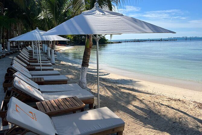Exclusive Beach Club Catamaran Isla Mujeres Tour - Key Points