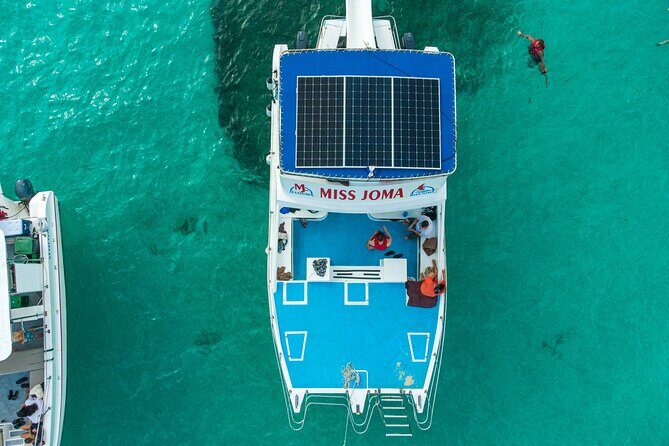 Experience for families and friends by private boat with pick-up - The Sum Up