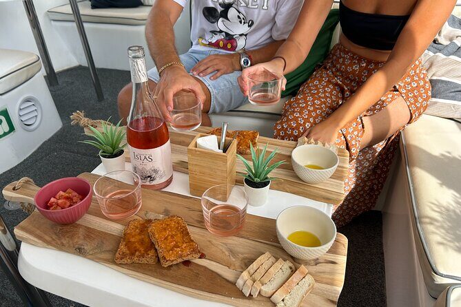 Explore Gran Canaria: Boat Tour with Wine & Local food Tasting - Discovering the Coast of Mogán from the Water