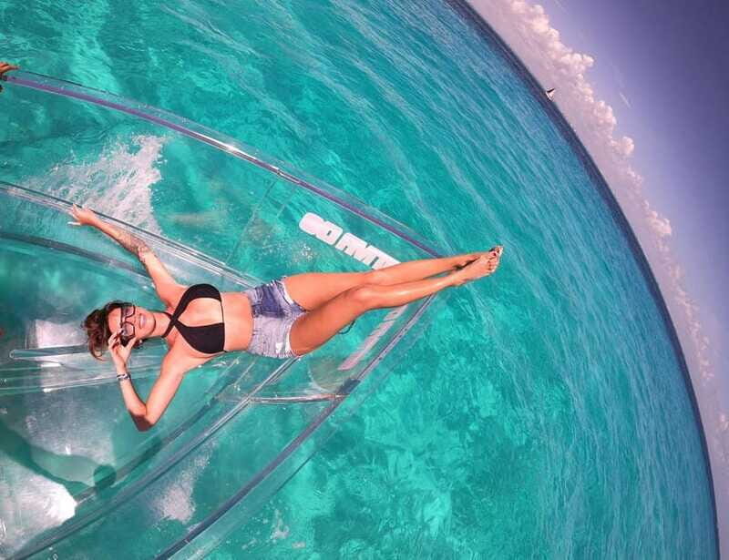 Explore the sea of cozumel in a transprent boat with drinks and snorkel. - The Sum Up