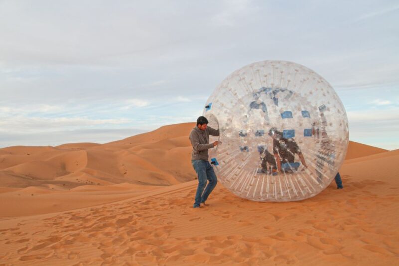 Extreme Adventure With Harness Zorbing in Merzouga Dunes - Transportation and Photographic Opportunities