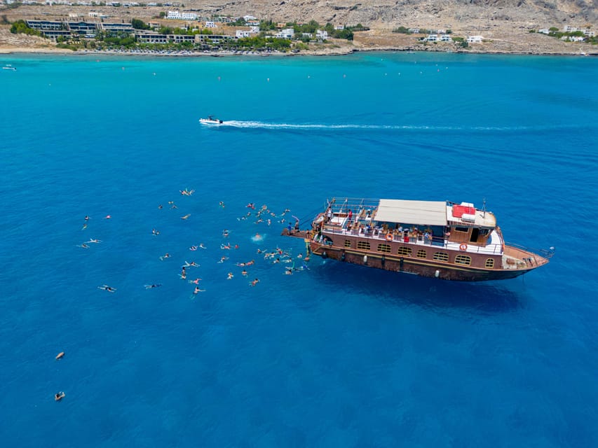 Faliraki : Transfer & Cruise to Lindos with 3 Swimming Stops - Overview of the Experience