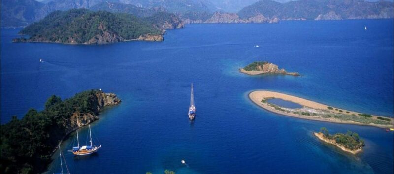 Fethiye: 12 Islands Boat Tour With Lunch and Hotel Pickup - Discovering Butterfly Valley
