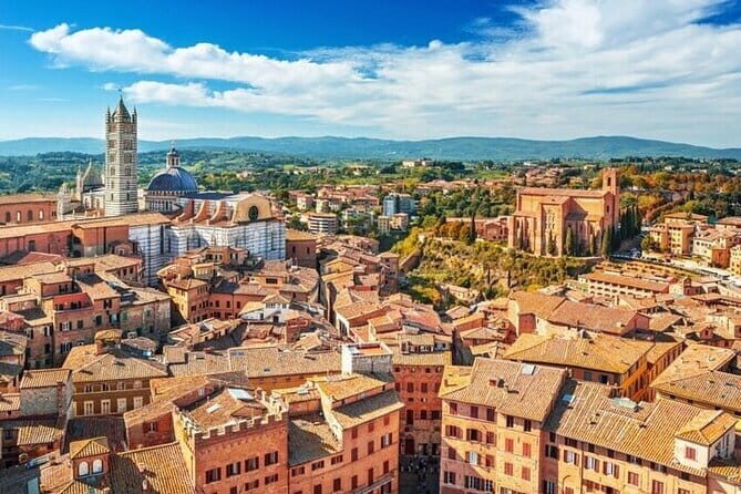 Florence: Day Trip with Free Time in San Gimignano and Siena - Exploring San Gimignano: The Medieval Sky-Town