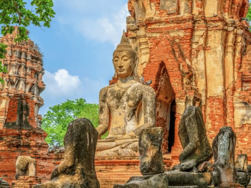 From Bangkok: Ayutthaya Tour, Elephant Palace & Royal Kraal - Key Attractions: Wat Maha That