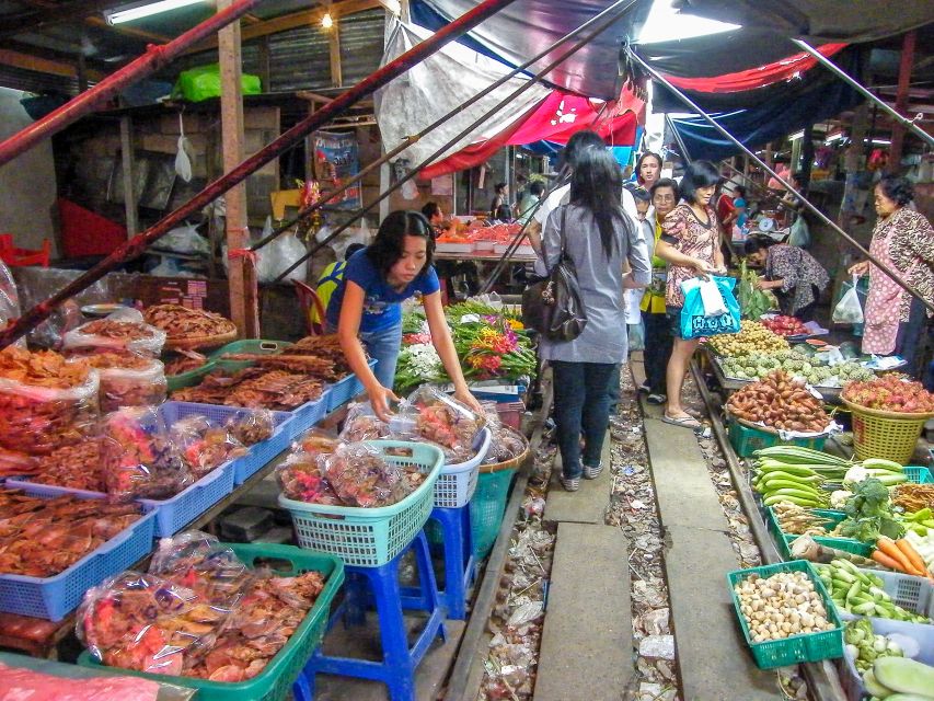 From Bangkok: Damnoen Saduak & Train Market Tour in English - Frequently Asked Questions