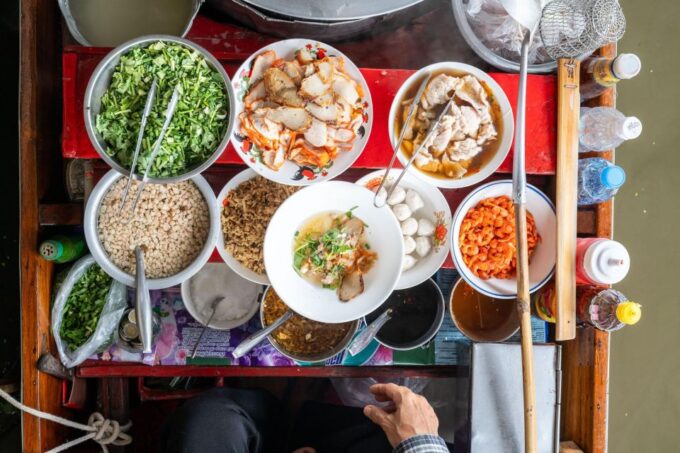 From Bangkok: Railway & Damnoen Saduak Floating Market Tour - Baan Tao Thai Derm