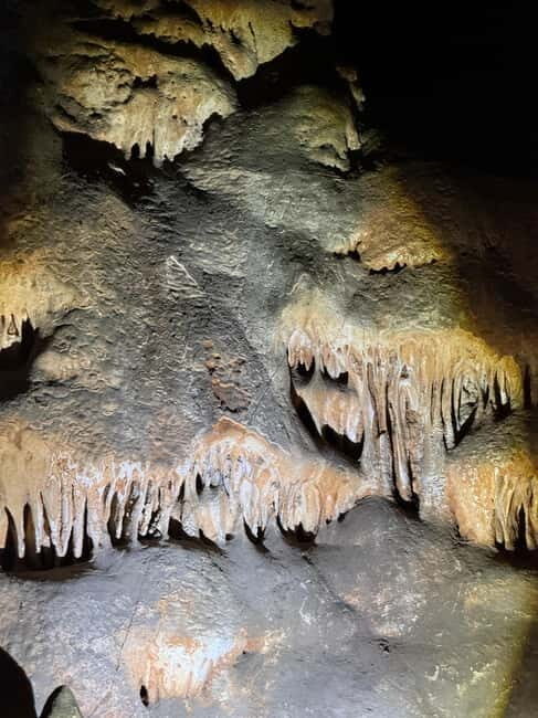 From Barcelona: Montserrat Caves and Mountain Hike Tour - The Experience of the Cave Exploration