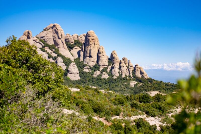 From Barcelona: Montserrat Monastery, Easy Hike, Cable Car - Key Points