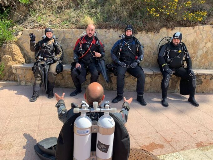 From Barcelona: Tossa De Mar Scuba Diving and 3-Course Meal - Cancellation and Refund Policy