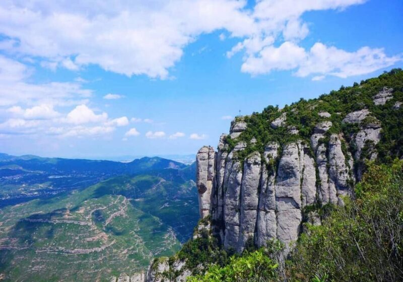 From Barcelona: Train Route and Cable Car to Montserrat - Visiting the Monastery of Montserrat