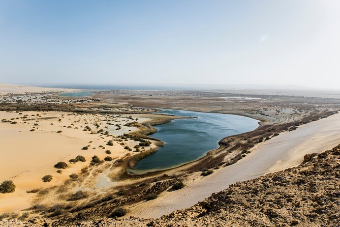 From Cairo: Desert Safari, Waterfalls, Sand Boarding and Camel Ride With Lunch - Itinerary and Schedule Breakdown