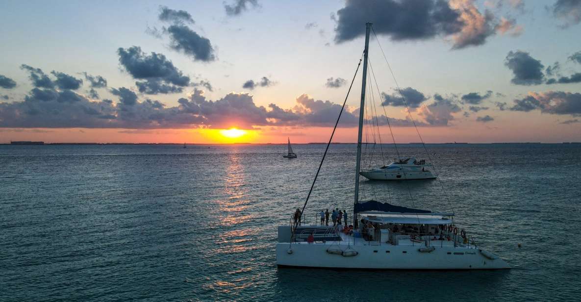 From Cancún: Isla Mujeres Sunset Catamaran Cruise - Tour Duration and Languages