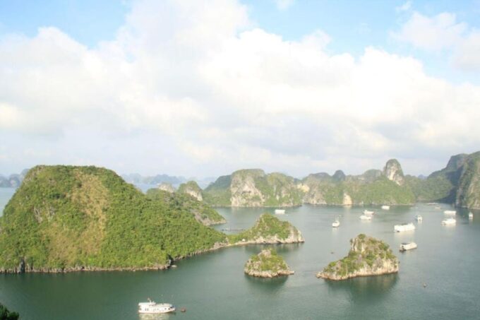 From Ha Noi: Explore Ha Long Bay & 6-Hour Cruise on Day Trip - Relaxing Sunset Party