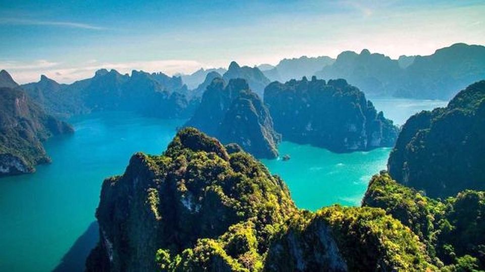 From Khao Lak: Khao Sok Lake, Bamboo Rafting and Cave Tour - Captivating Cave Discoveries