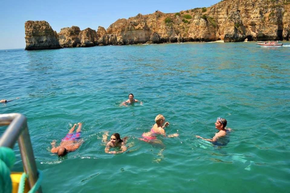 From Lagos: 2.5-Hour Guided Coastal Boat Tour & Grotto Visit - Key Points