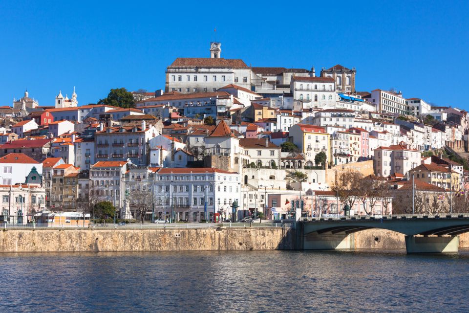 From Lisbon: Aveiro, Moliceiro Boat and Coimbra Tour - Exploring Coimbras Riverside Convent