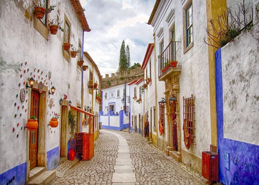 From Lisbon: Óbidos and Nazaré Private Half-Day Tour - Pricing and Booking Details