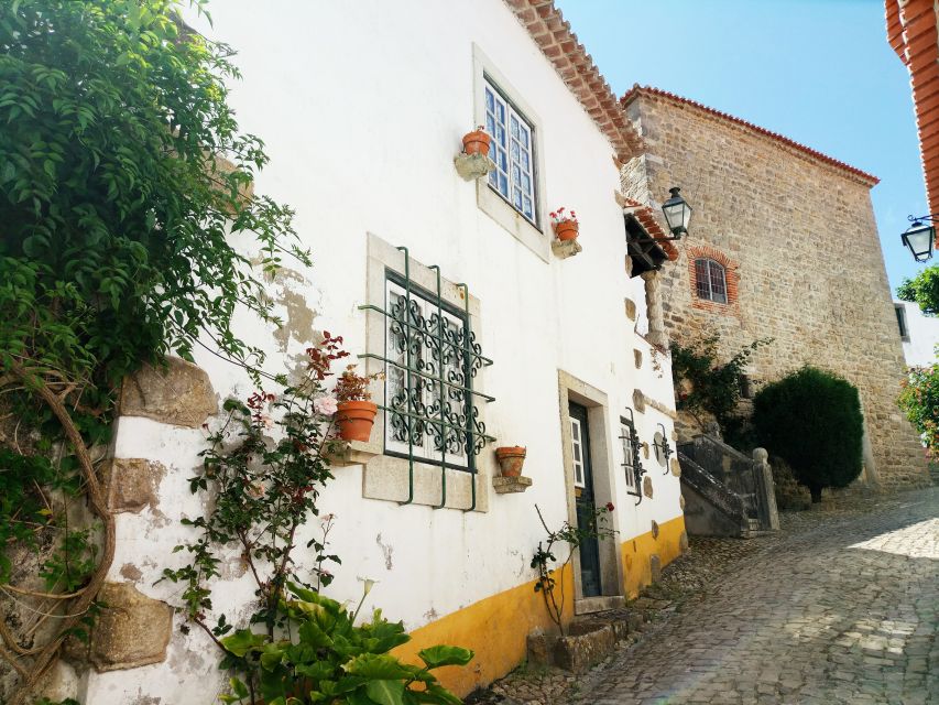 From Lisbon: Obidos and Tomar Day Trip With Transfer - Visiting the Obidos Castle