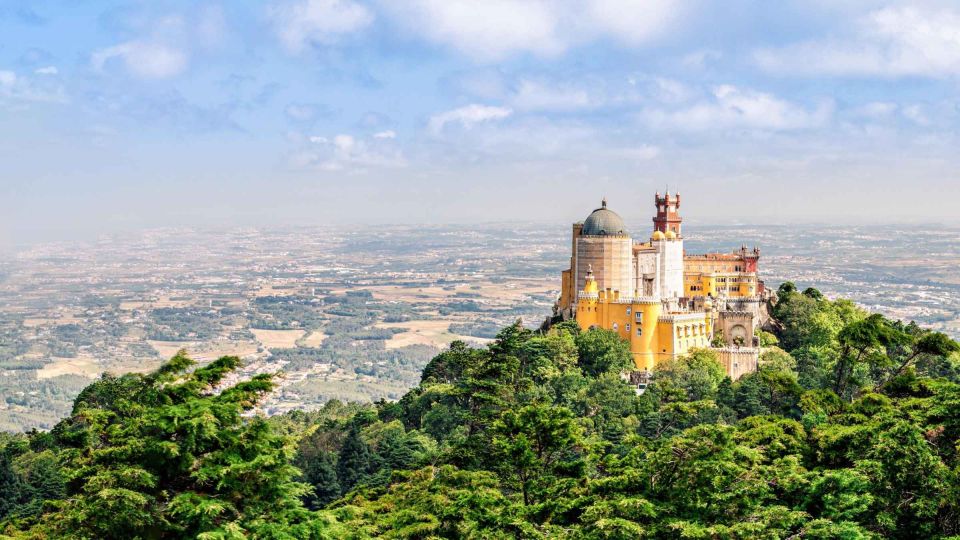 From Lisbon: Pena Palace, Regaleira, Sintra & Cascais Tour - Visiting Pena Palace