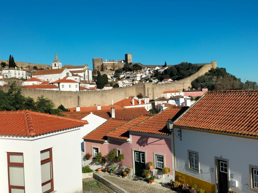 From Lisbon: Private Eco-Tour to Alcobaça, Nazaré & Óbidos - Discover Medieval Óbidos