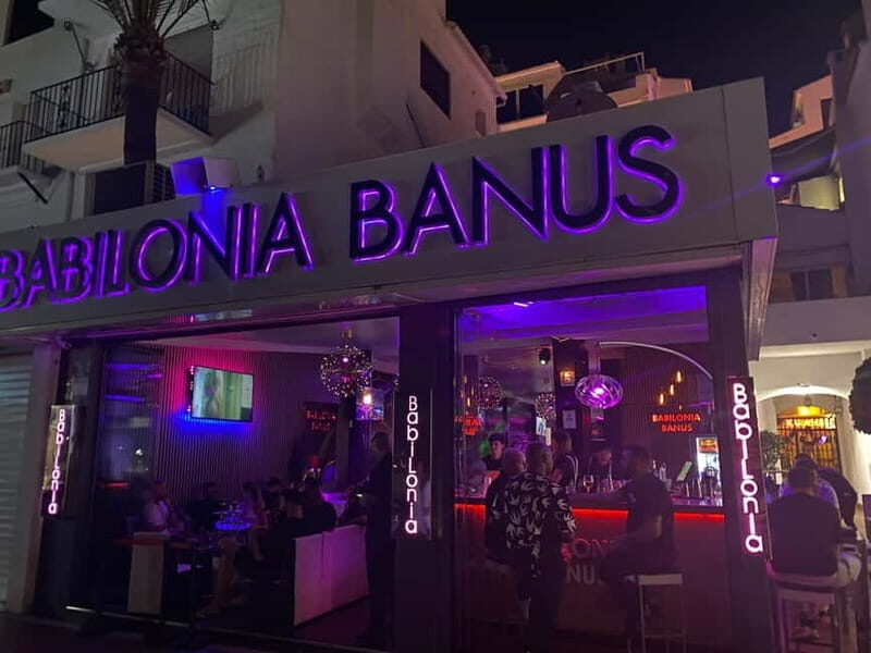 From Marbella, Estepona: Club tour Puerto Banus including transport and drink - Exploring the Puerto Banús Club Tour