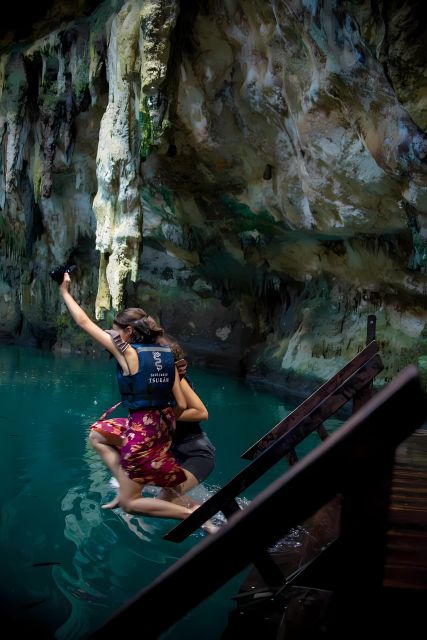 From Merida: Chichen Itza + Mayan Sanctuary and Cenote - Taking in Cenote