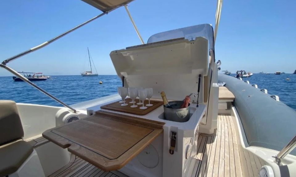 From Naples: Capri Boat Tour With Island Stop and Snorkeling - Visiting the Natural Landmarks