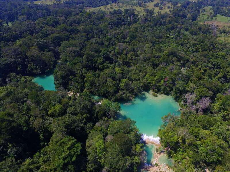 From Palenque: Palenque Ruins and waterfalls Roberto Barrios - Returning to Palenque: End of the Day