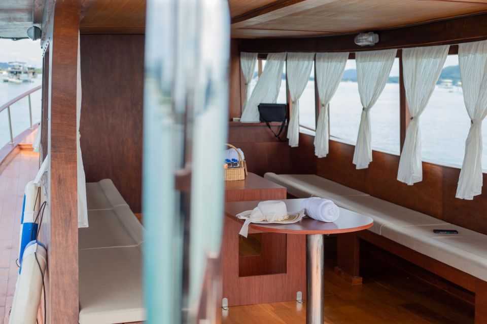 From Phuket: Vintage Wooden Boat Charter to Racha Island - Departure and Arrival