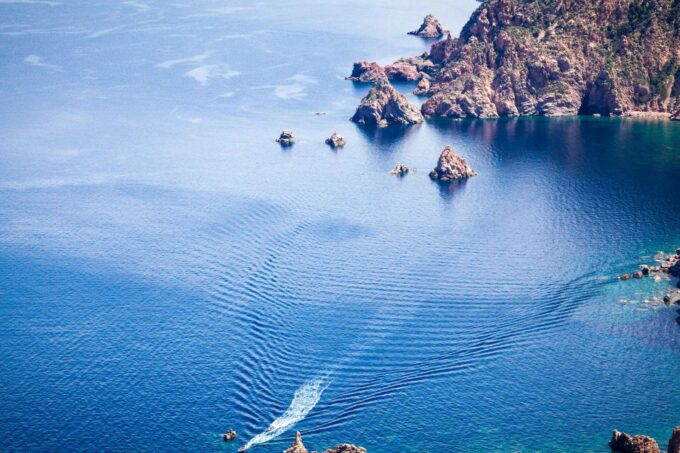 From Porto: Scandola and Calanche De Piana Boat Tour - Booking Details and Participant Restrictions
