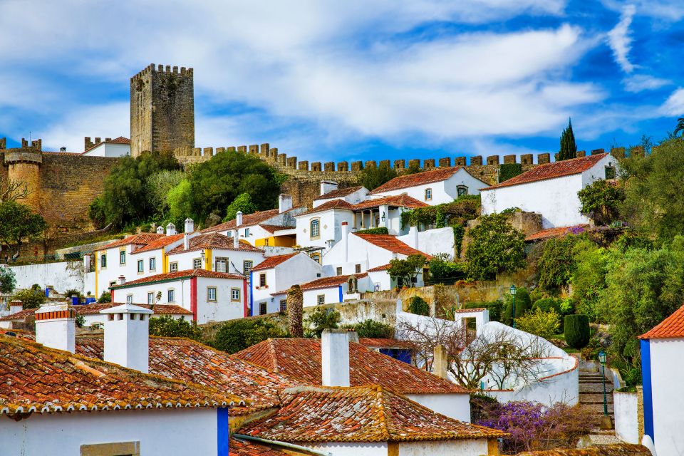From Sesimbra: Private Fátima, Batalha, Nazaré & Óbidos Tour - Batalha Monastery Exploration