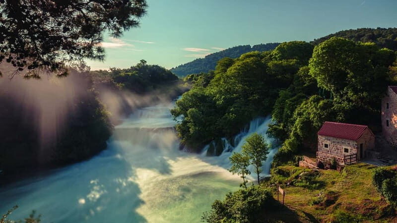 From Split: Krka Waterfalls with Riverboat Ride & swimm stop - The Riverboat Experience